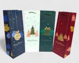 Подарунковий пакет високий картон 200грм, "Новорічний" МІКС 4 види, 12*35*10 см 6 шт. в уп. /12/ Подарунковий пакет високий картон 200грм, "Новорічний" МІКС 4 види, 12*35*10 см 6 шт. в уп. /12/